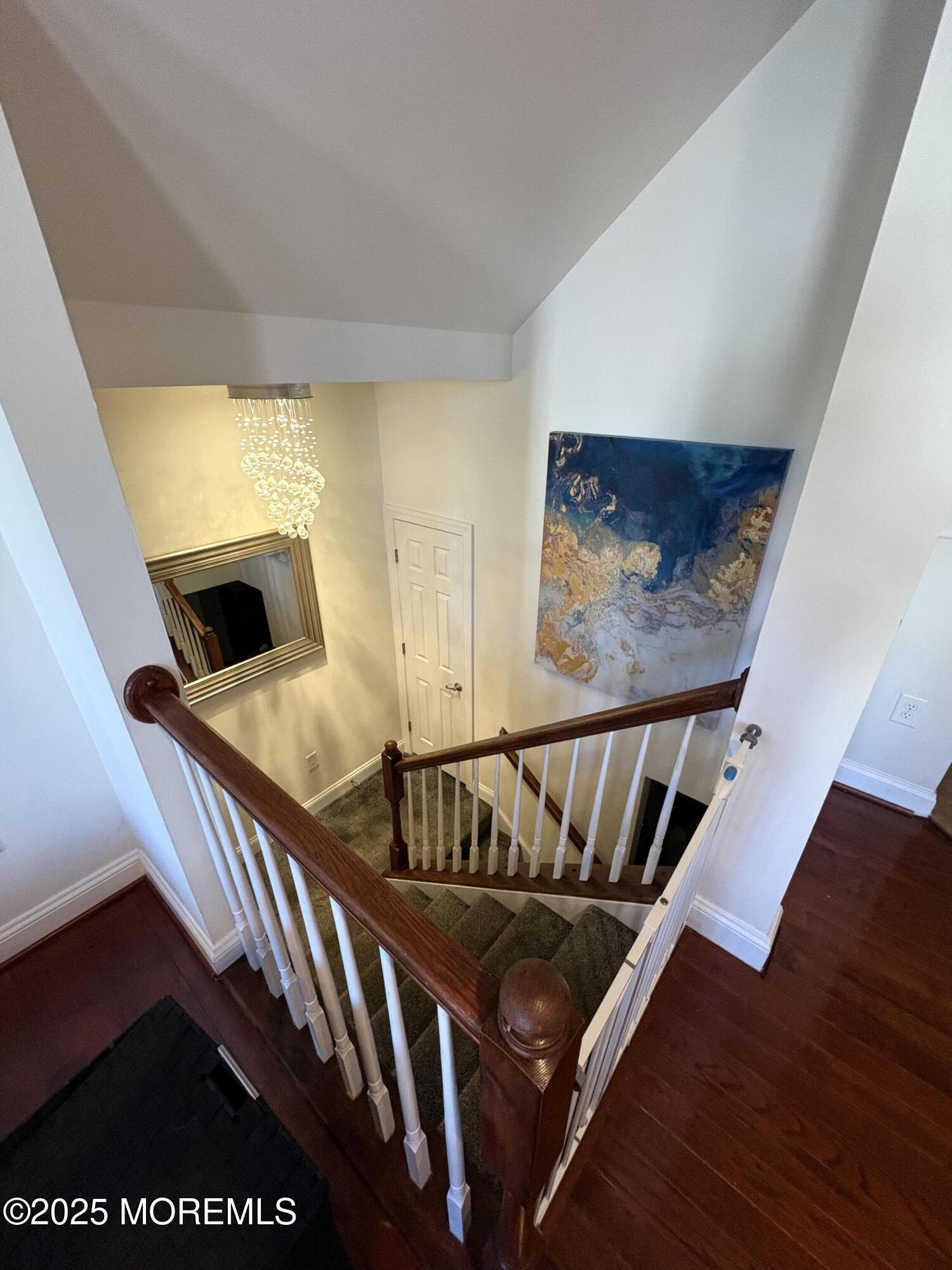 63 Pate Drive Middletown, NJ 07748 - Photo 14 of 50 a view of staircase with furniture and wooden floor