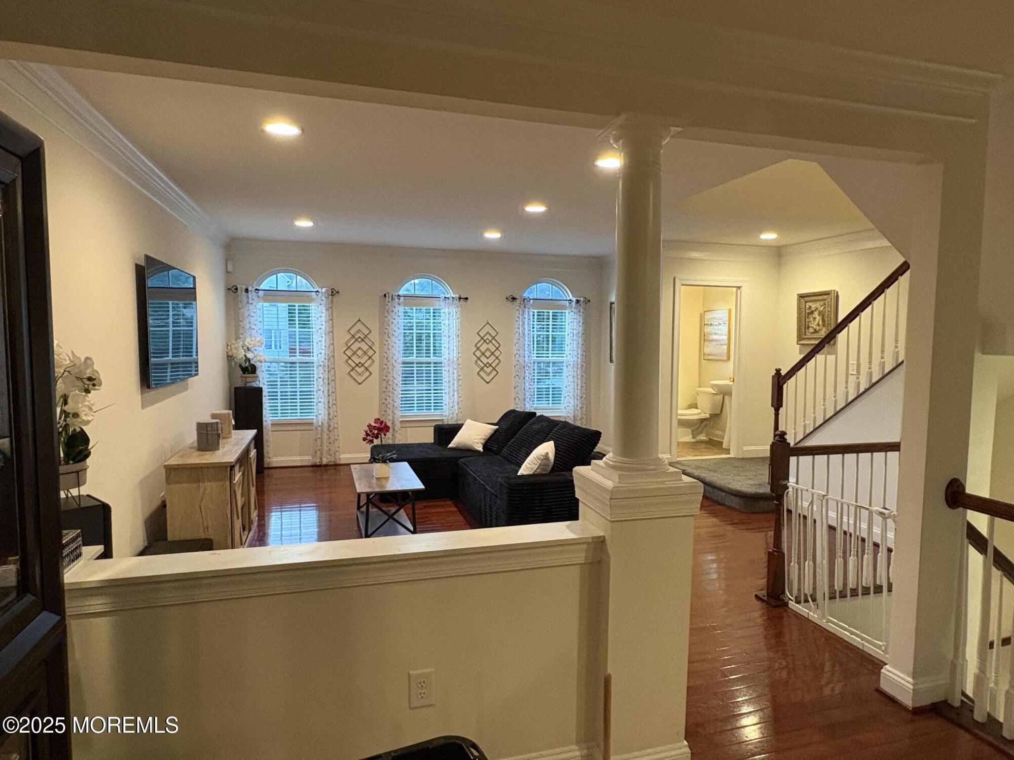63 Pate Drive Middletown, NJ 07748 - Photo 2 of 50 a living room with furniture window and wooden floor