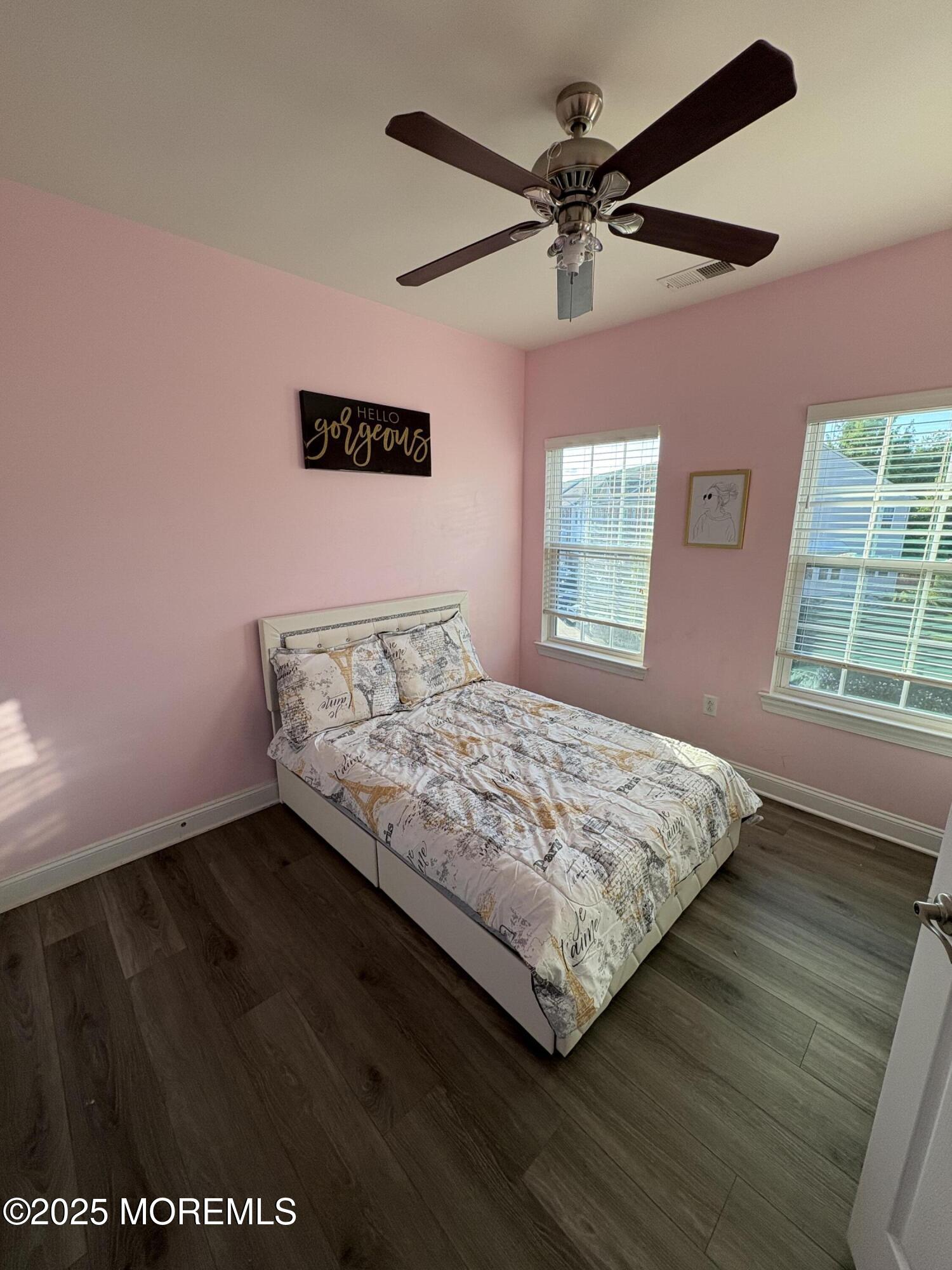 63 Pate Drive Middletown, NJ 07748 - Photo 28 of 50 a bed sitting in a bedroom next to a window