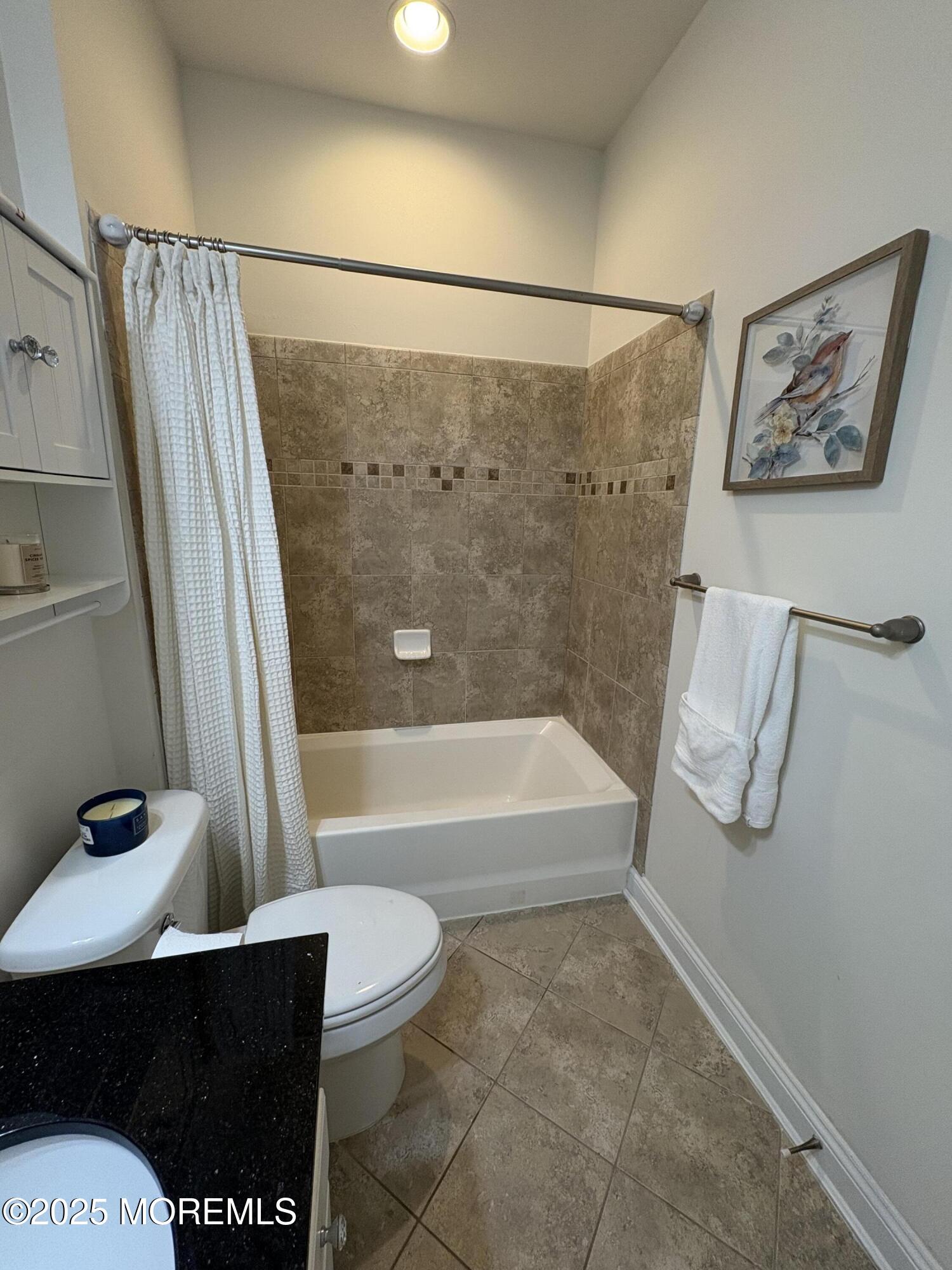 63 Pate Drive Middletown, NJ 07748 - Photo 33 of 50 a bathroom with a sink a toilet and a shower