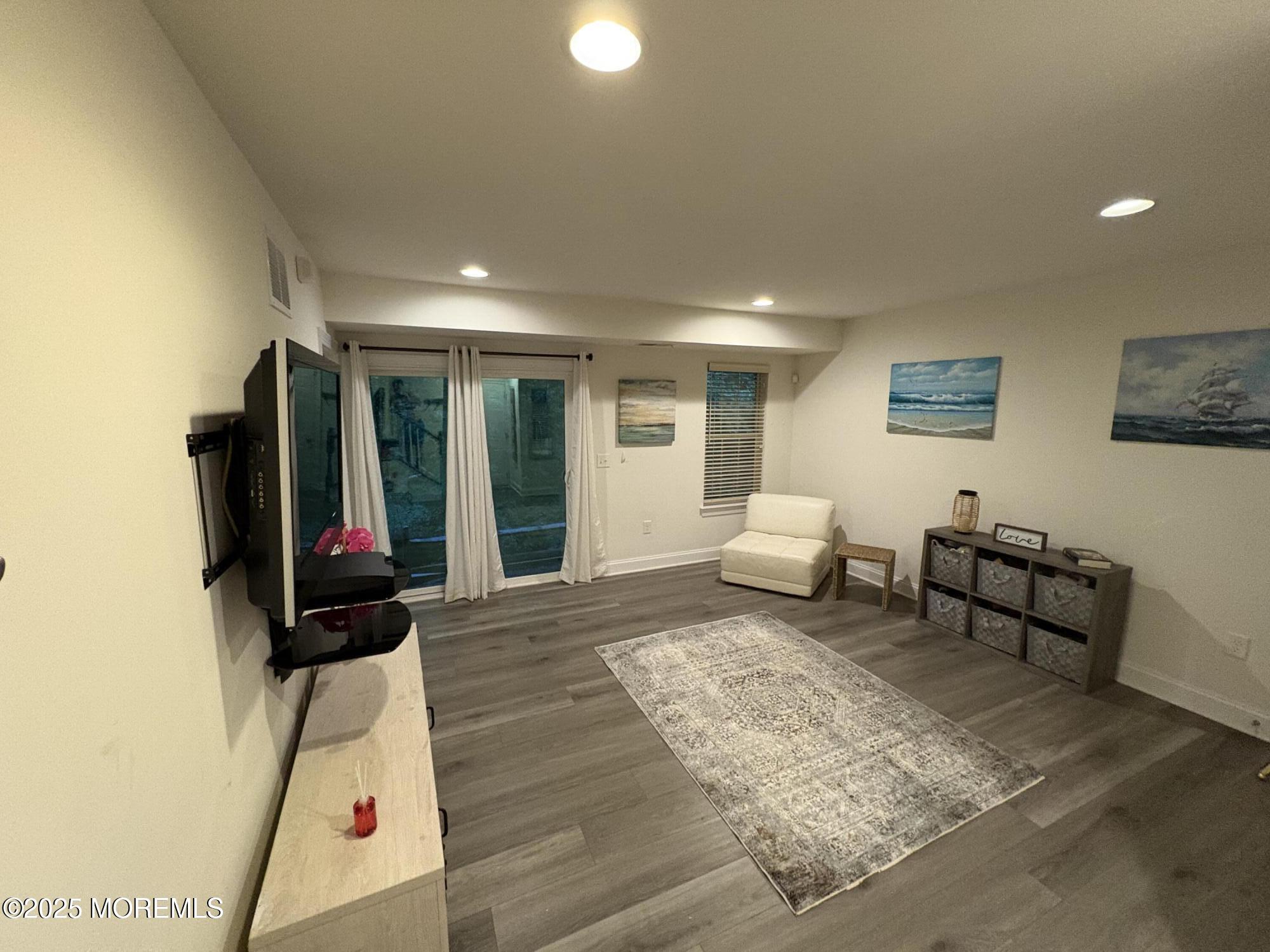 63 Pate Drive Middletown, NJ 07748 - Photo 36 of 50 a living room with furniture and white walls