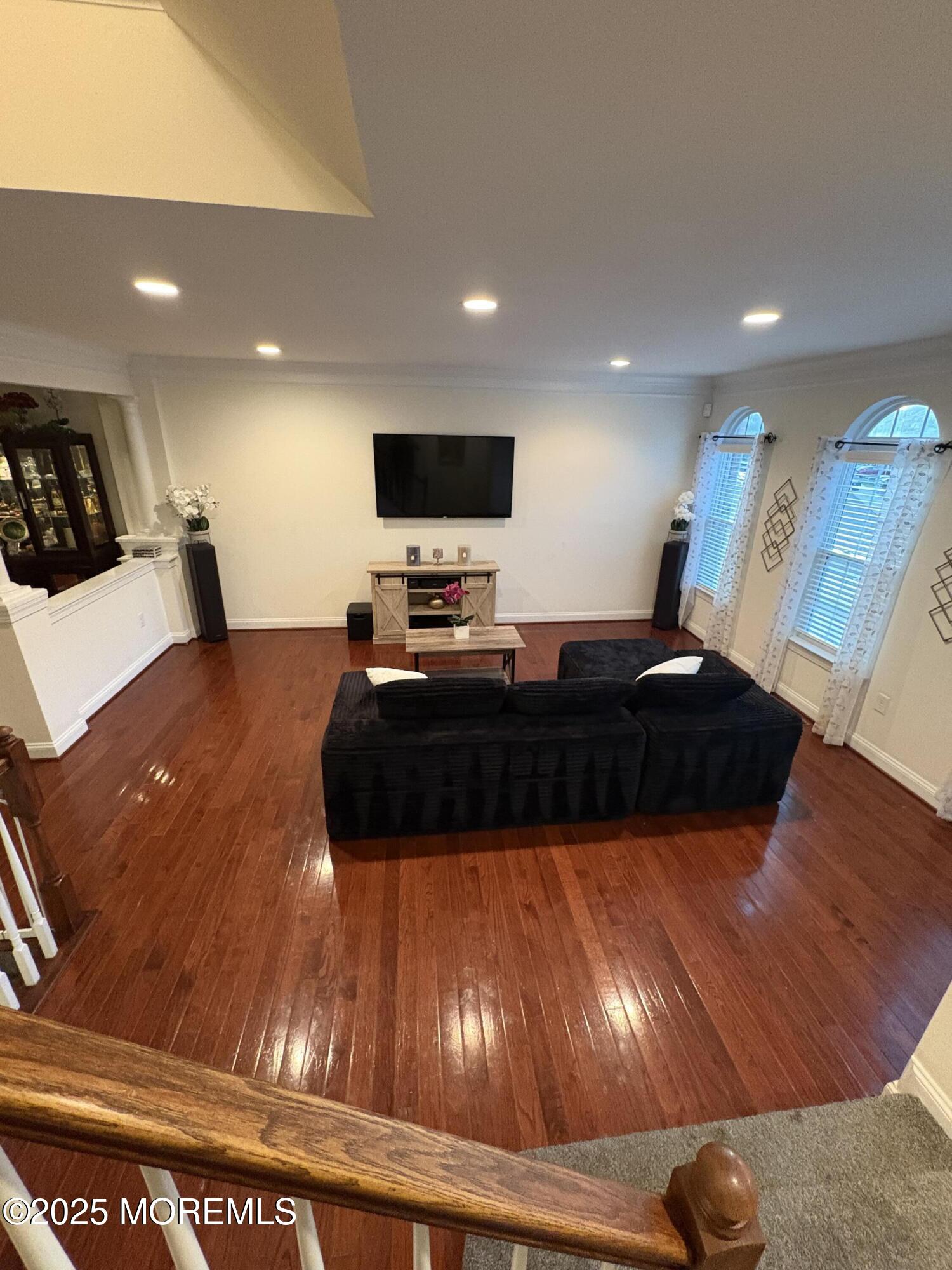 63 Pate Drive Middletown, NJ 07748 - Photo 4 of 50 a living room with furniture and a flat screen tv