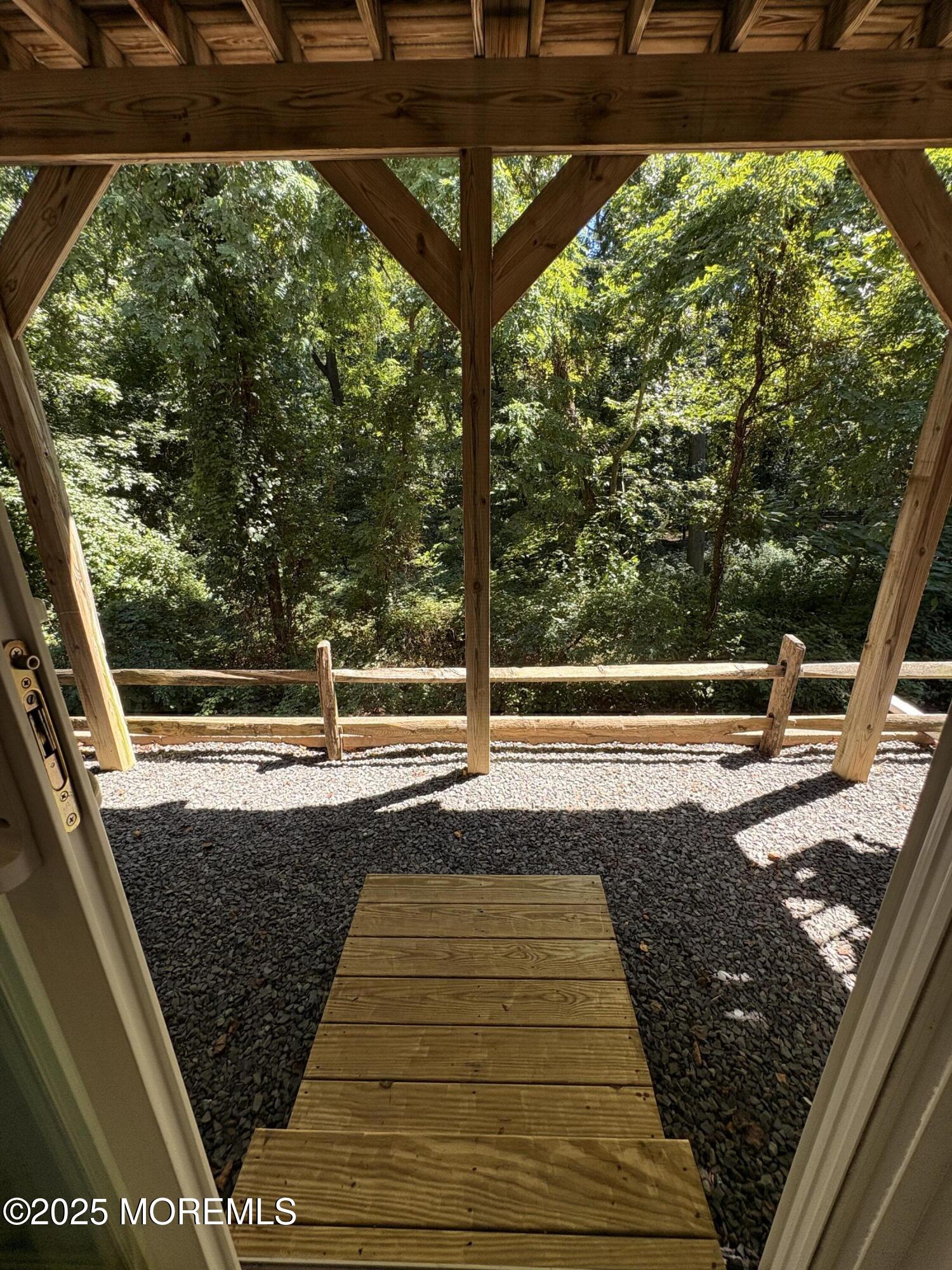 63 Pate Drive Middletown, NJ 07748 - Photo 45 of 50 a view of a balcony with an outdoor space