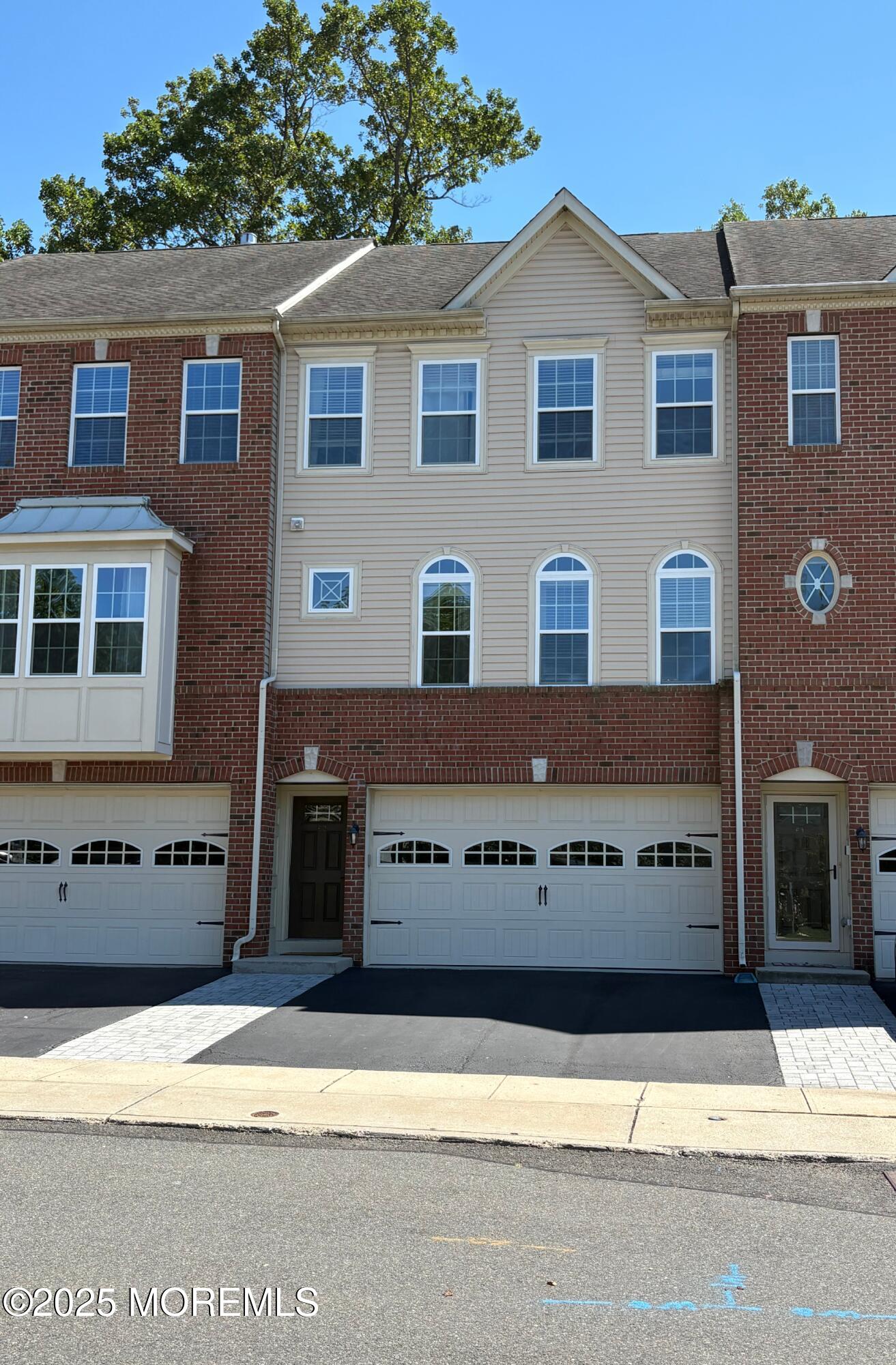 63 Pate Drive Middletown, NJ 07748 - Photo 50 of 50 a view of a building with a street