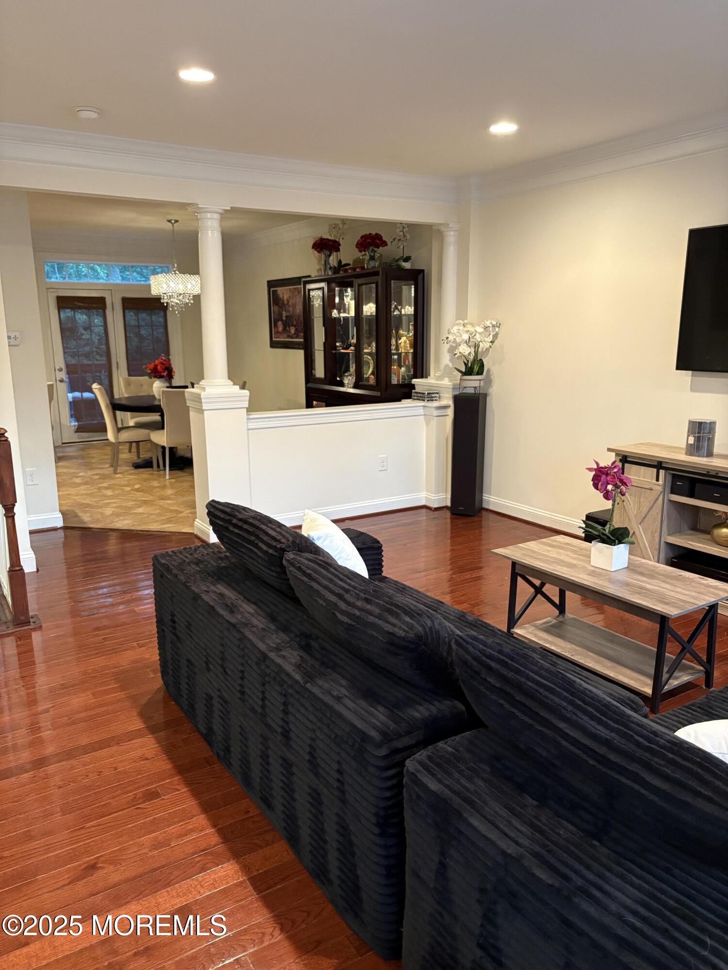 63 Pate Drive Middletown, NJ 07748 - Photo 5 of 50 a living room with furniture and wooden floor