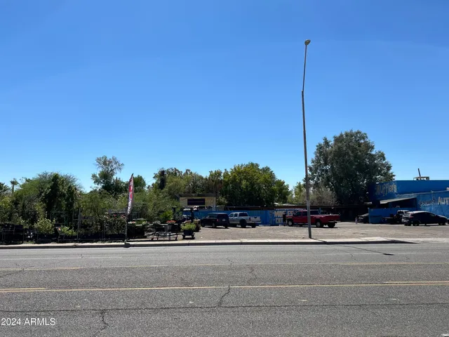 a view of a car parked in front of a house