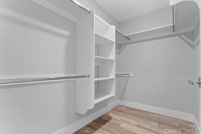 a view of an empty walk in closet