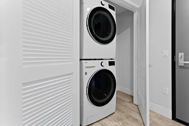 a view of a balcony with wooden floor