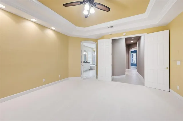 a spacious bathroom with a granite countertop sink a mirror a shower and a bathtub