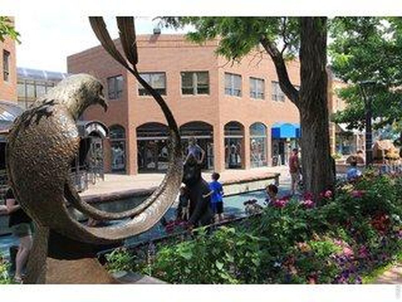 809 East Myrtle Street Fort Collins, CO 80524 - Photo 21 of 23 a front view of a house with garden