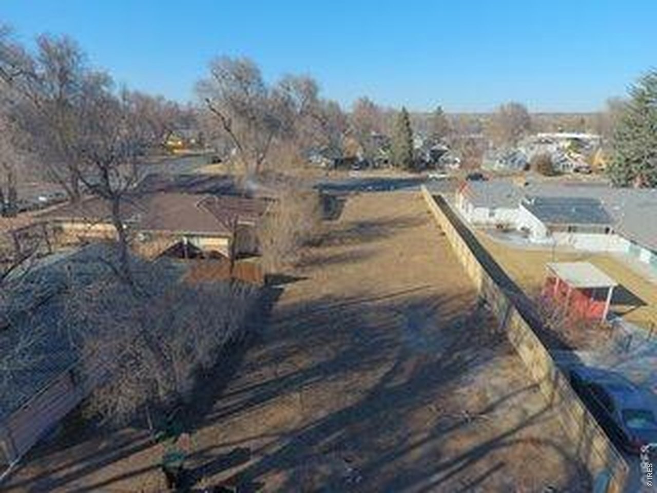809 East Myrtle Street Fort Collins, CO 80524 - Photo 4 of 23 a view of a swimming pool with a yard