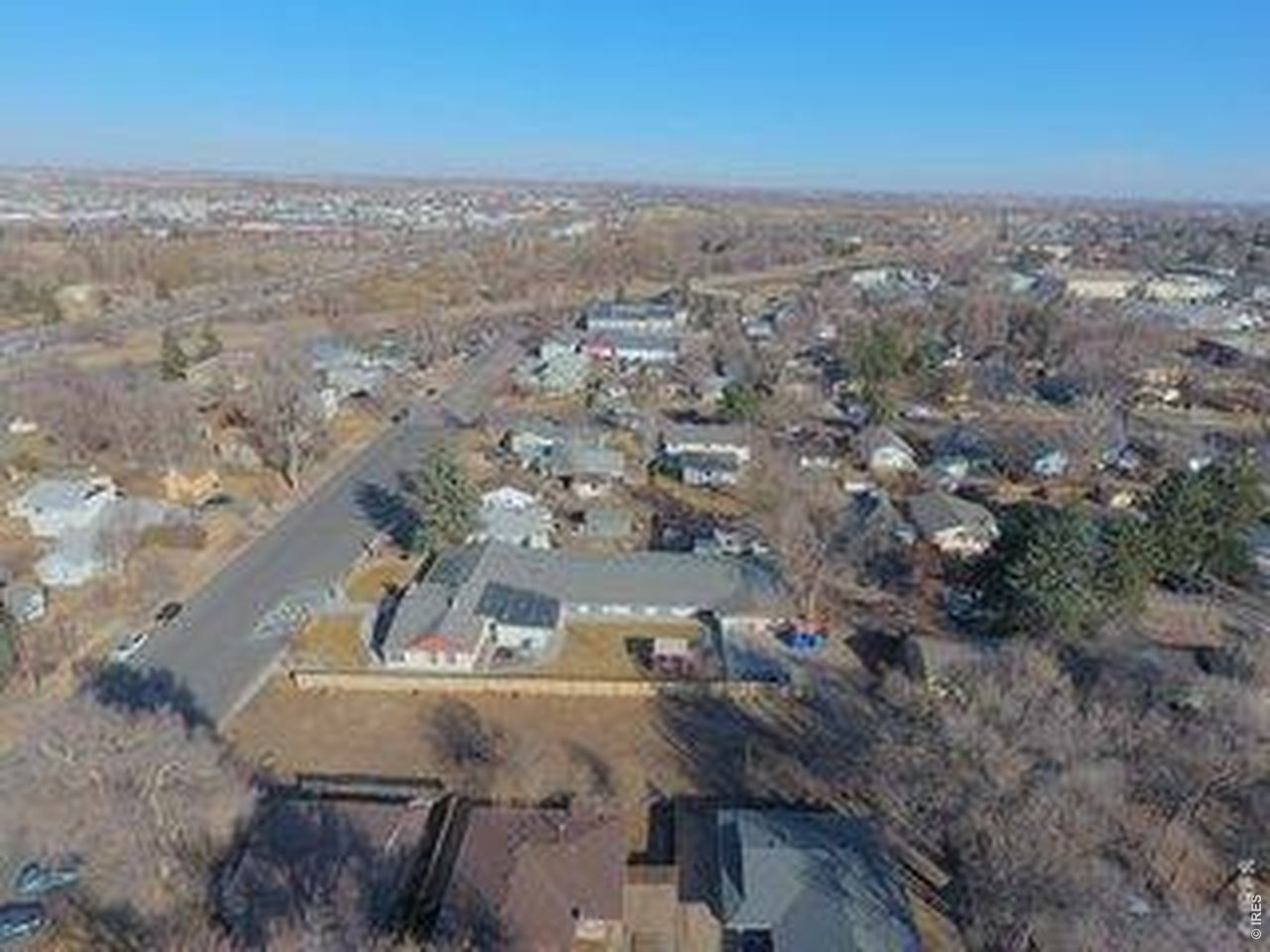 809 East Myrtle Street Fort Collins, CO 80524 - Photo 10 of 23 an aerial view of a house with a mountain