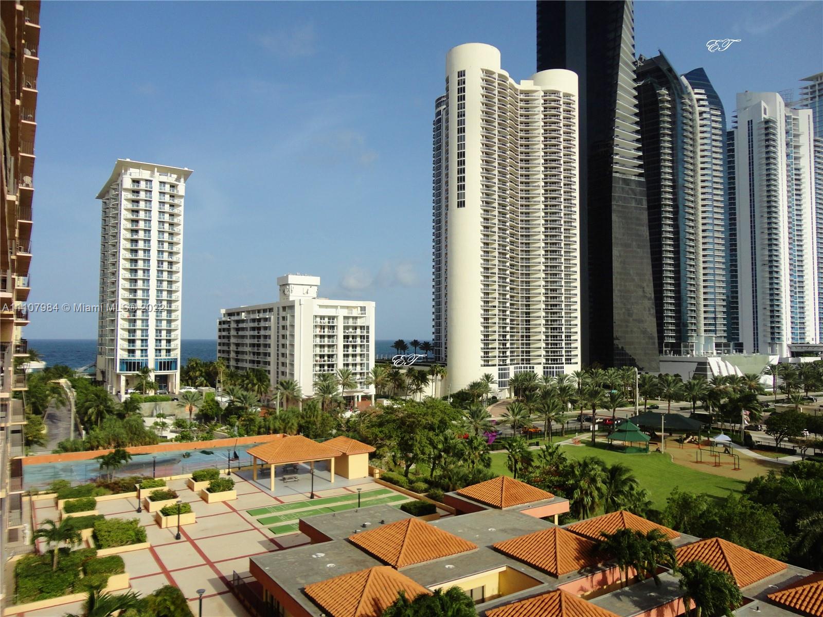 a front view of a city with tall buildings