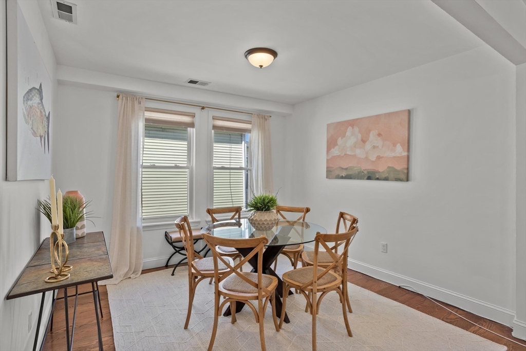 98 Flint Street, Unit 2 Somerville, MA 02145 - Photo 16 of 40 a dining room with furniture and window