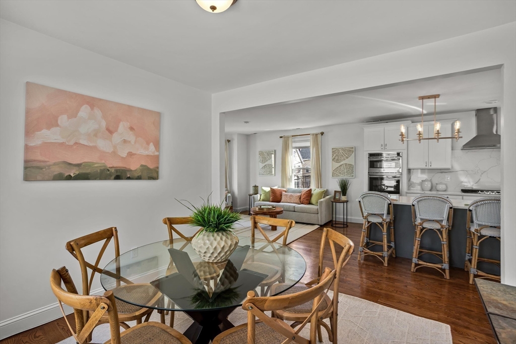 98 Flint Street, Unit 2 Somerville, MA 02145 - Photo 17 of 40 a dining room with furniture and window