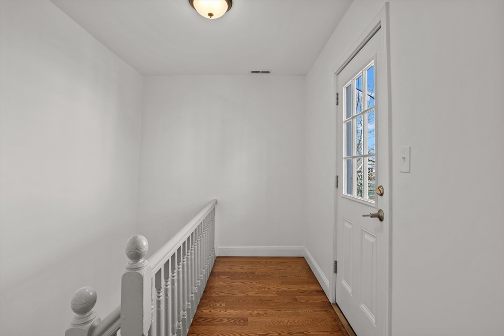 98 Flint Street, Unit 2 Somerville, MA 02145 - Photo 21 of 40 a view of a hallway