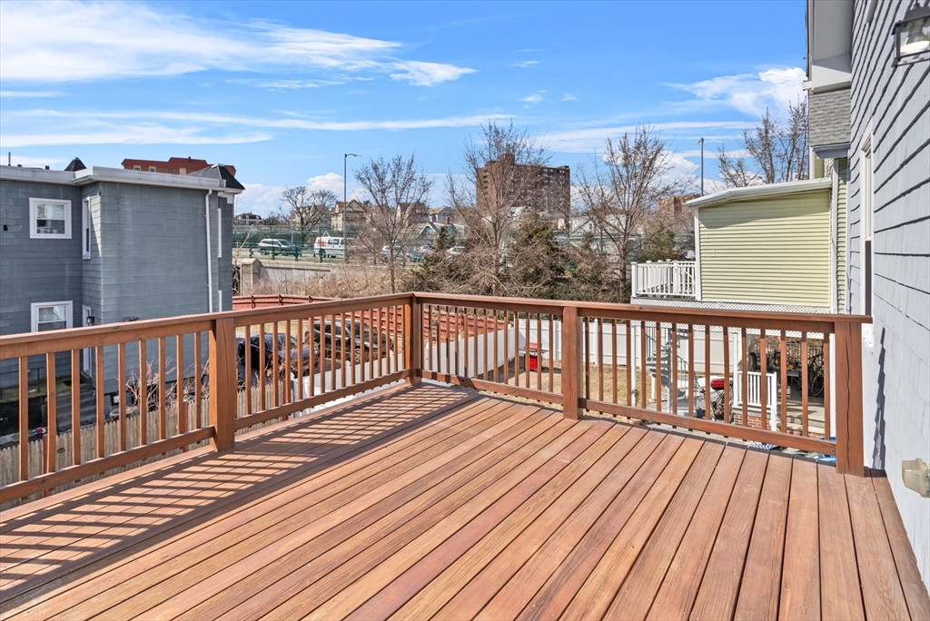 98 Flint Street, Unit 2 Somerville, MA 02145 - Photo 36 of 40 a view of city from a balcony