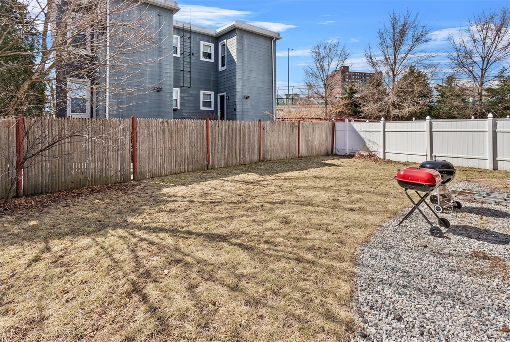 98 Flint Street, Unit 2 Somerville, MA 02145 - Photo 39 of 40 a view of a backyard