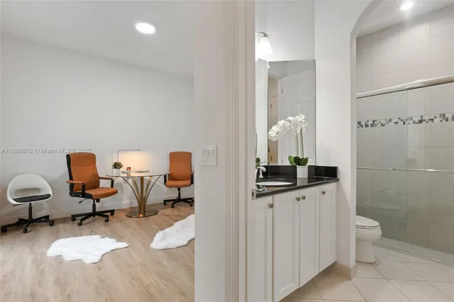 a workspace with furniture and a window