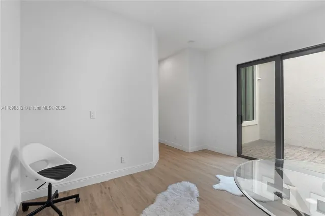 a bed room with a bed and a chandelier