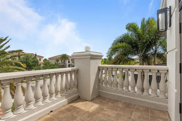 a view of a patio with couches chairs and a fire pit