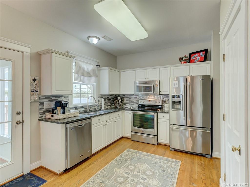 2589 Lower Assembly Drive Fort Mill, SC 29708 - Photo 14 of 48 a kitchen with a sink cabinets and stainless steel appliances