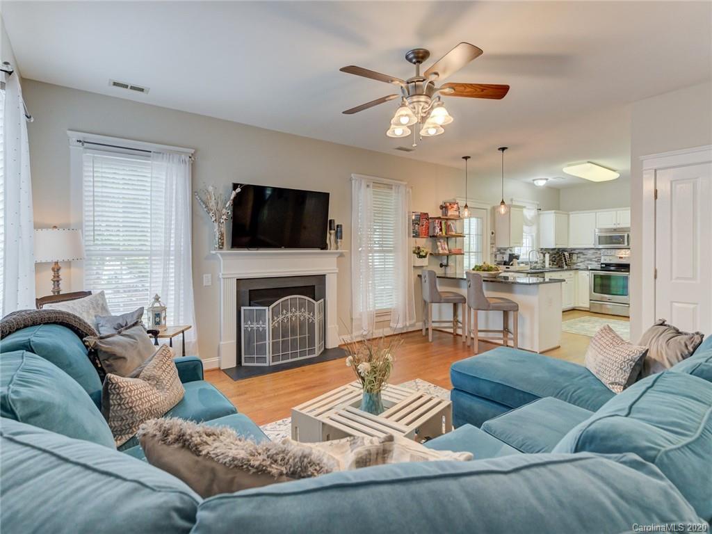 2589 Lower Assembly Drive Fort Mill, SC 29708 - Photo 22 of 48 a living room with furniture and a fireplace