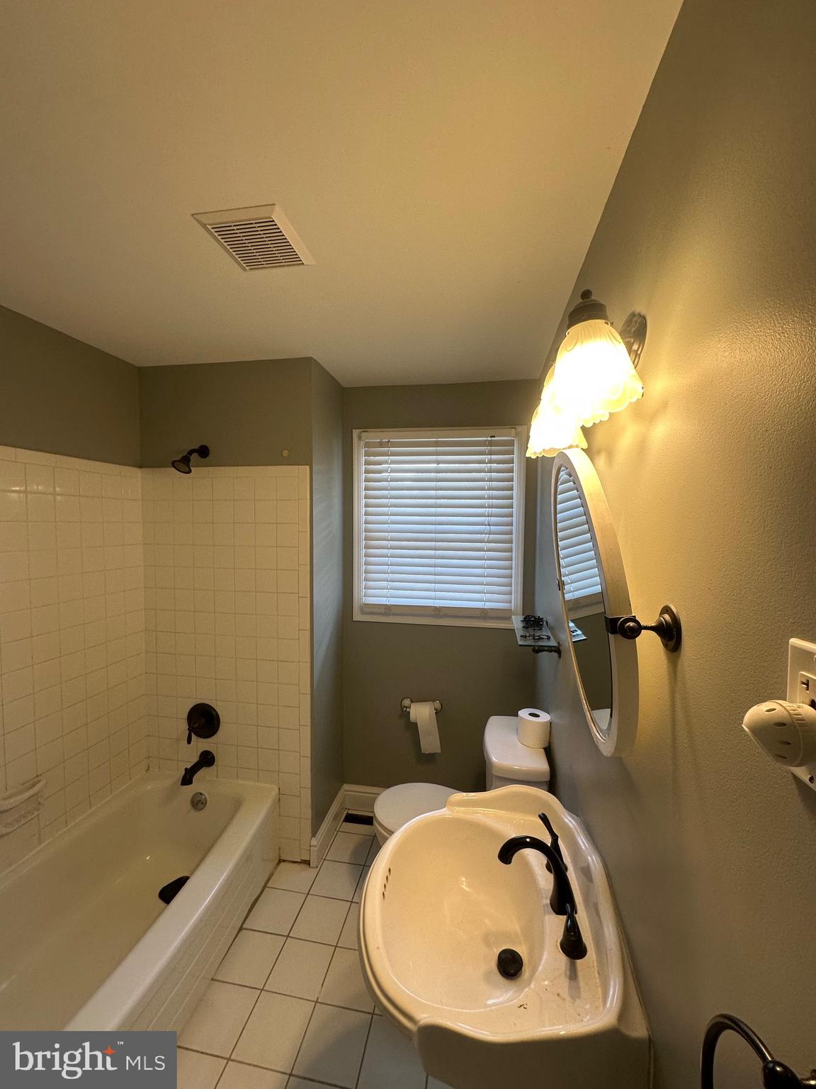 649 Miami Road Wenonah, NJ 08090 - Photo 5 of 11 a bathroom with a sink a toilet and shower