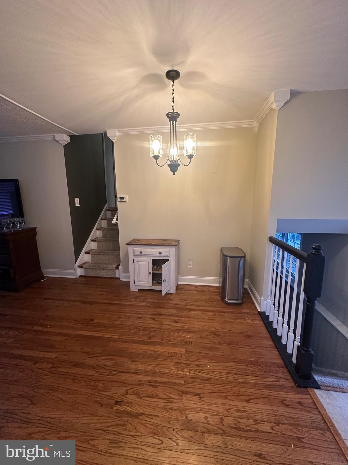 649 Miami Road Wenonah, NJ 08090 - Photo 6 of 11 a living room with furniture and a chandelier