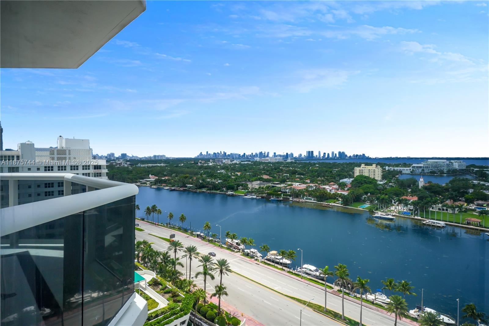 4779 Collins Avenue, Unit 1805 Miami Beach, FL 33140 - Photo 16 of 39 a view of a lake with a city