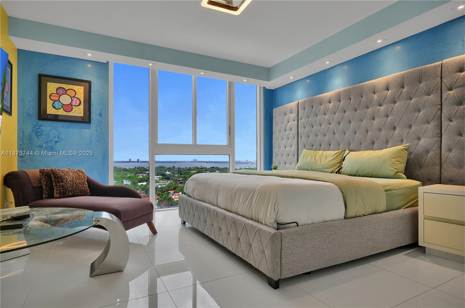 4779 Collins Avenue, Unit 1805 Miami Beach, FL 33140 - Photo 25 of 39 a bedroom with a bed and window