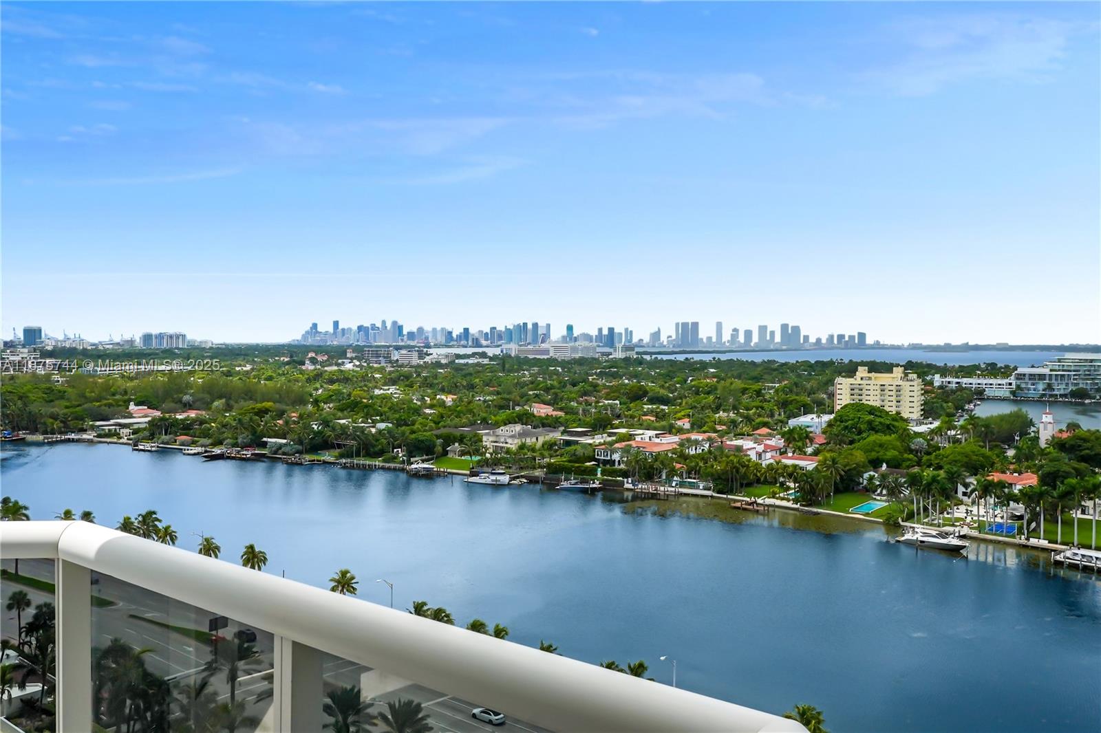 4779 Collins Avenue, Unit 1805 Miami Beach, FL 33140 - Photo 28 of 39 an aerial view of a city and lake view