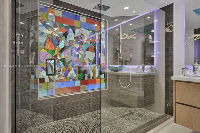 a bathroom with a sink vanity and a mirror