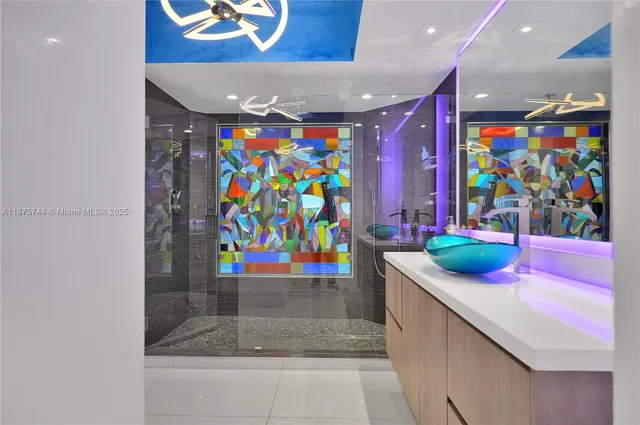 a bathroom with a toilet sink and a mirror