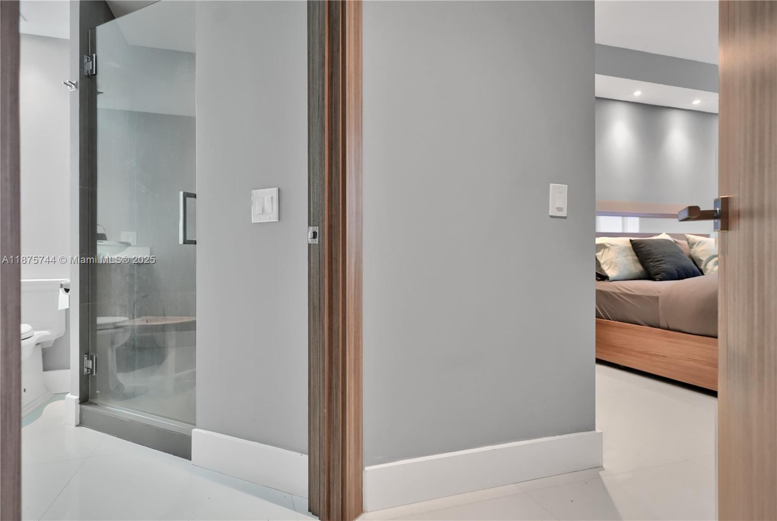 4779 Collins Avenue, Unit 1805 Miami Beach, FL 33140 - Photo 33 of 39 a bathroom with a tub shower and sink