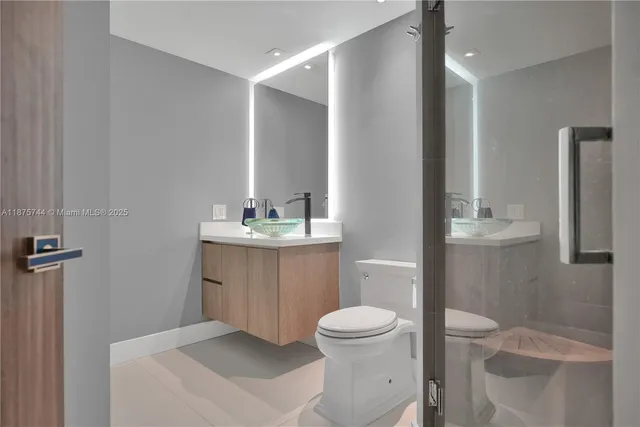 a view of a building with a yard