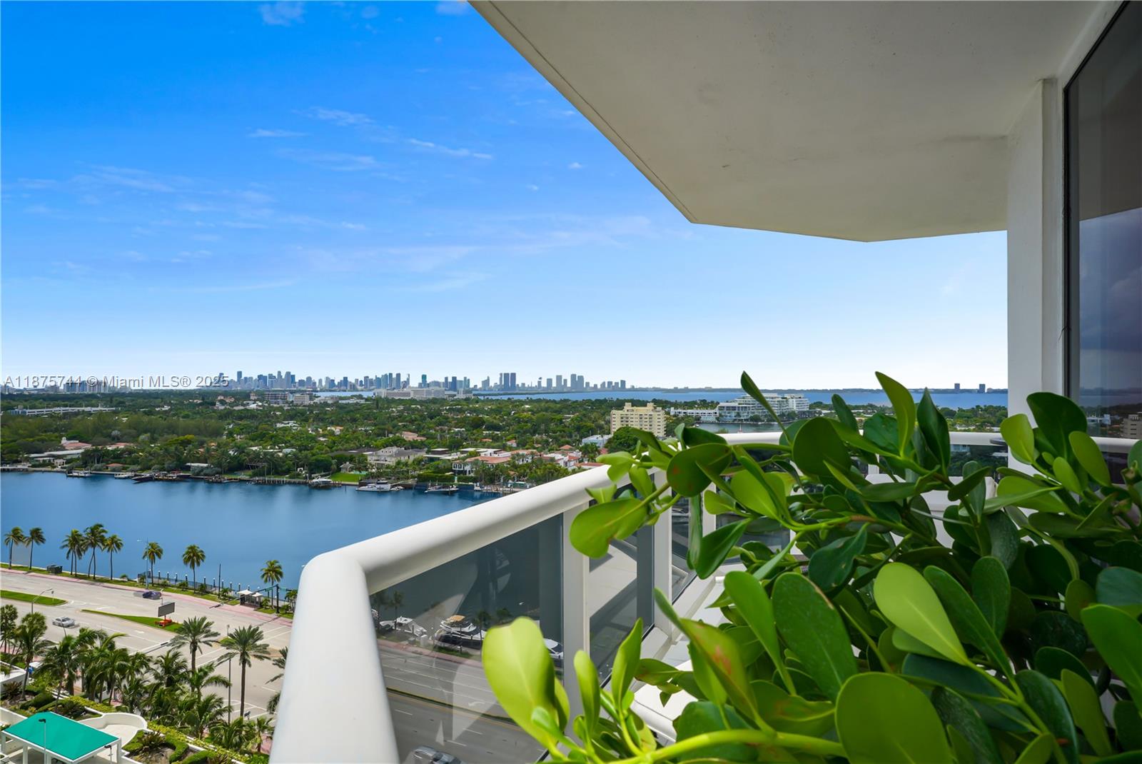 4779 Collins Avenue, Unit 1805 Miami Beach, FL 33140 - Photo 4 of 39 a view of a lake with a mountain in the background