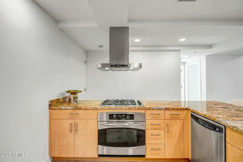 a room with a couch and a stove