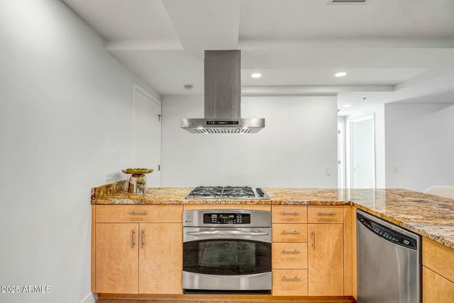 a room with a couch and a stove