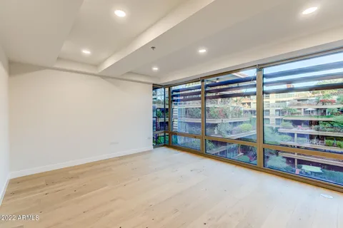 a view of an empty room with a sliding door