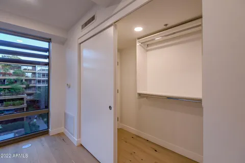 a bathroom with a shower and a sink
