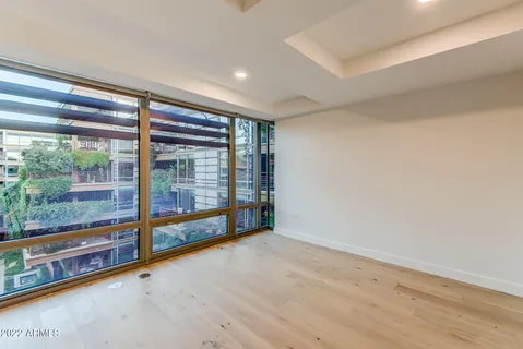 a bathroom with a shower and a toilet