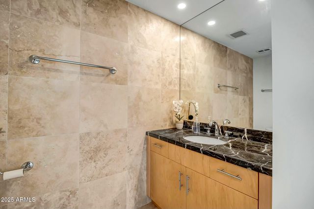 a room with furniture and a large window