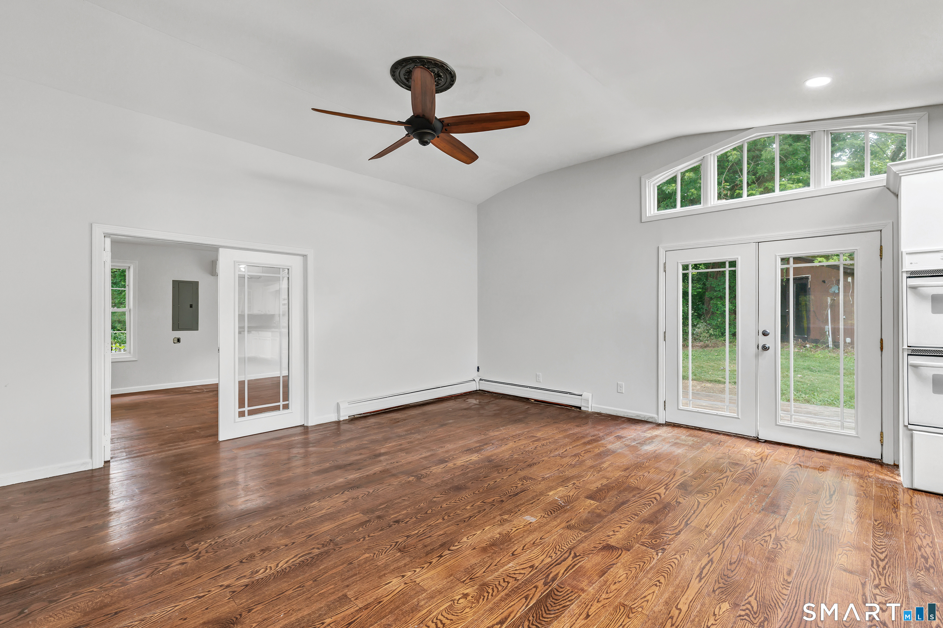17 Woodlawn Road Monroe, CT 06468 - Photo 19 of 37 French doors open to the deck and an expansive yard perfect for outdoor recreation