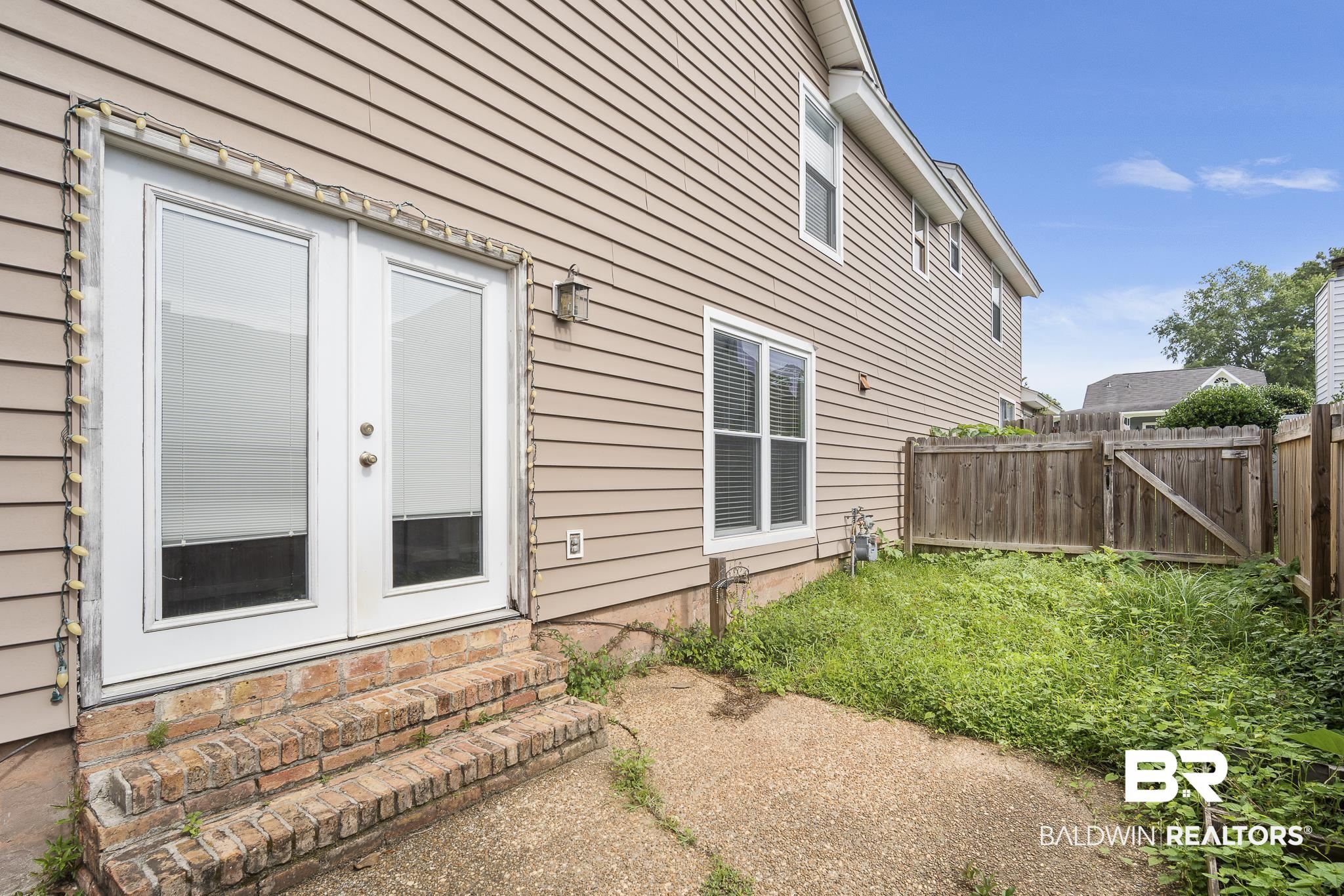 6513 Cedar Bend Court, Unit B Mobile, AL 36608 - Photo 21 of 23 Back Patio and Yard