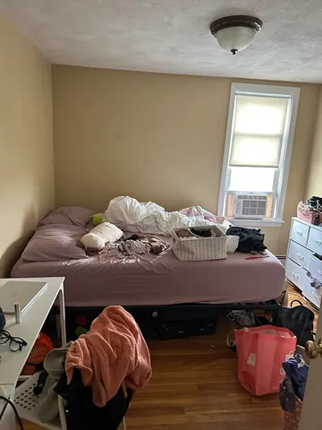 a room with furniture and a window