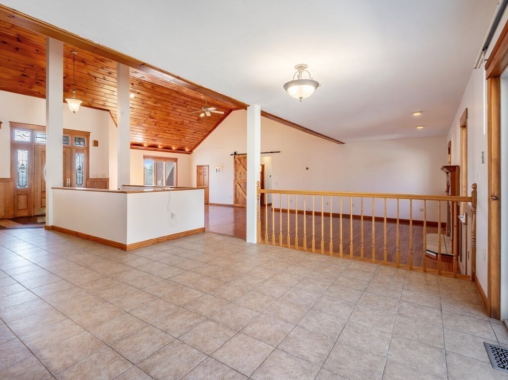 4 Thurston Hill Road Rutland, MA 01543 - Photo 15 of 35 a view of a porch with a tv
