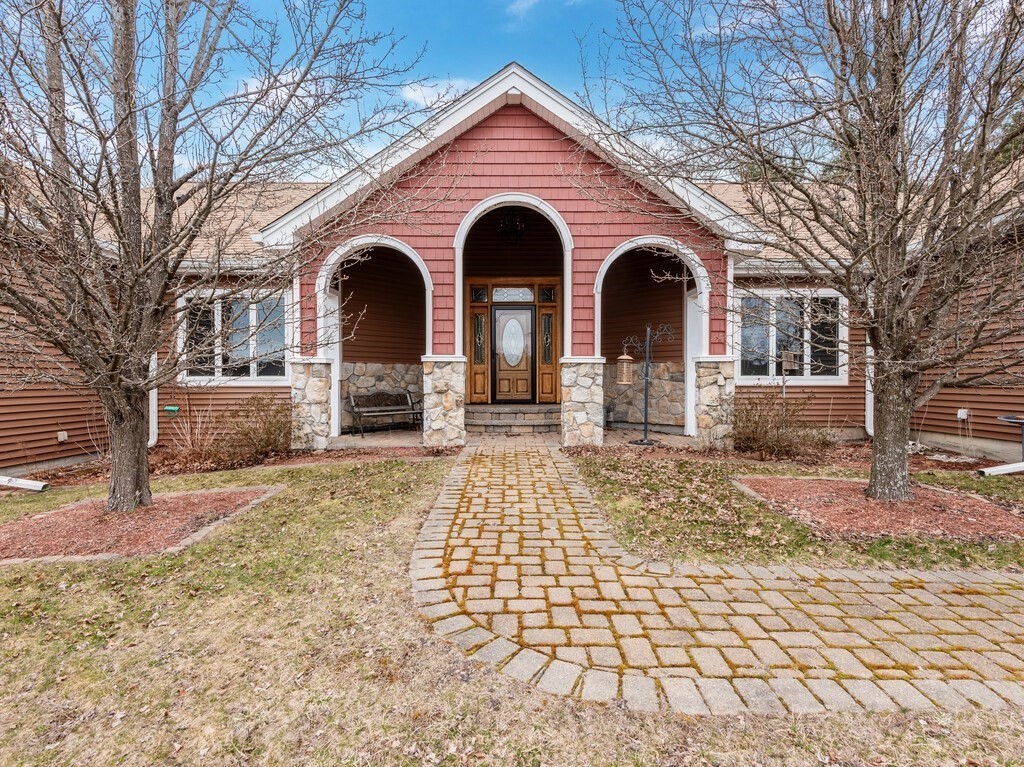 4 Thurston Hill Road Rutland, MA 01543 - Photo 2 of 35 a front view of a house with garden