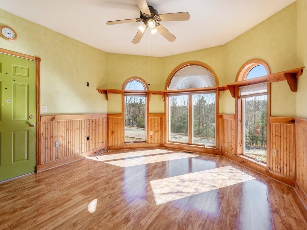 4 Thurston Hill Road Rutland, MA 01543 - Photo 22 of 35 a bedroom with a large bed and a large window