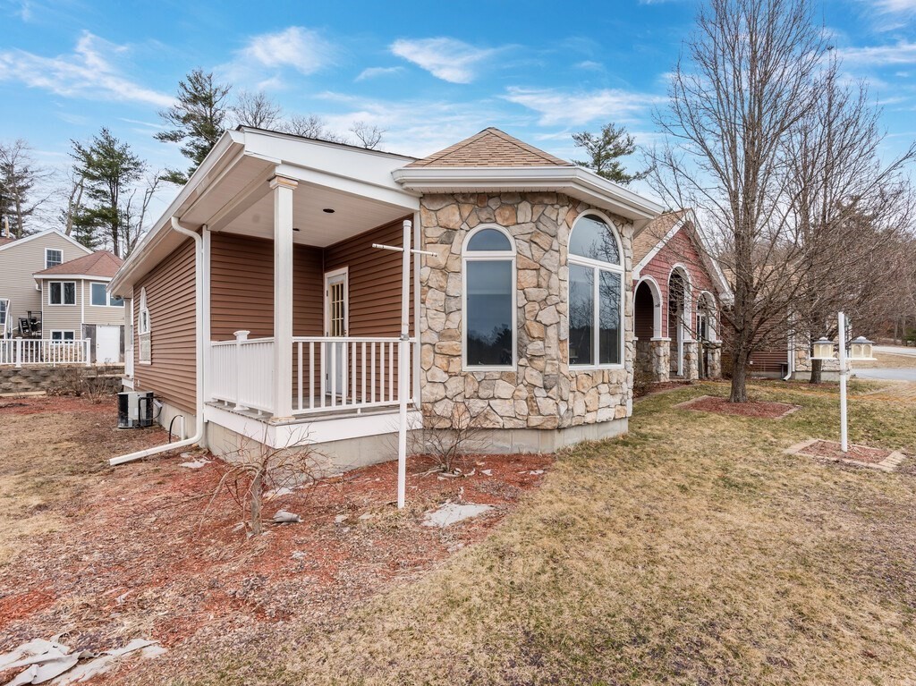 4 Thurston Hill Road Rutland, MA 01543 - Photo 3 of 35 a front view of a house with garden